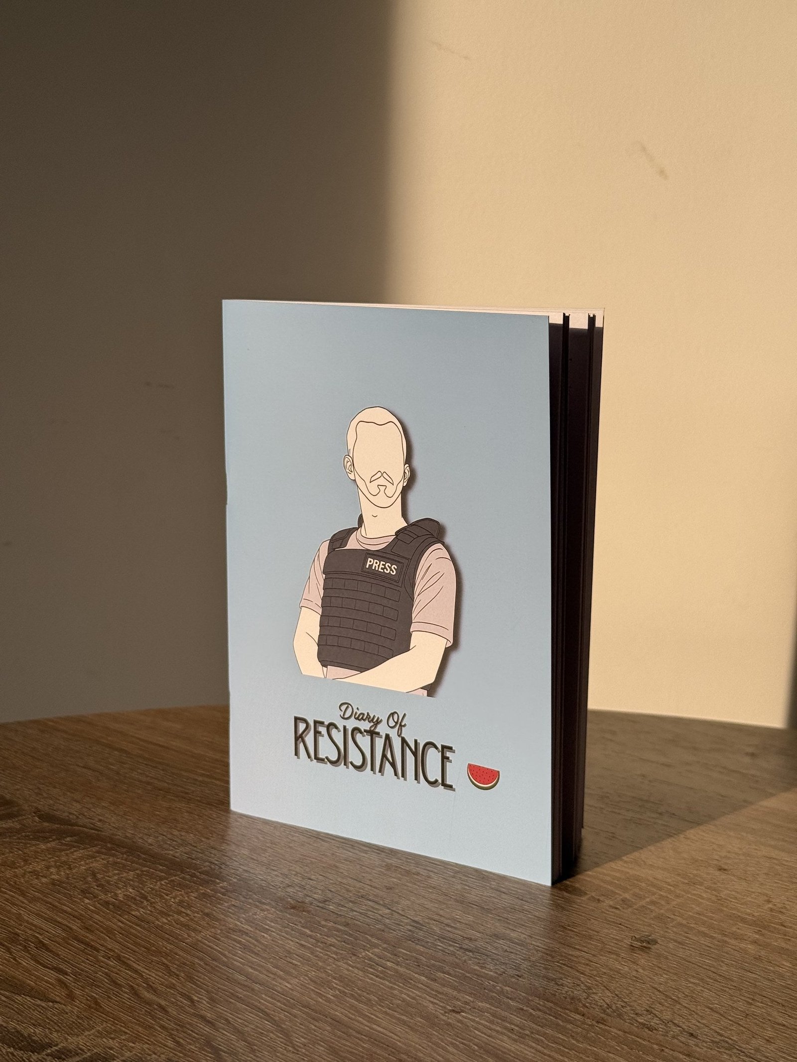Diary of Resistance Palestine journal, standing