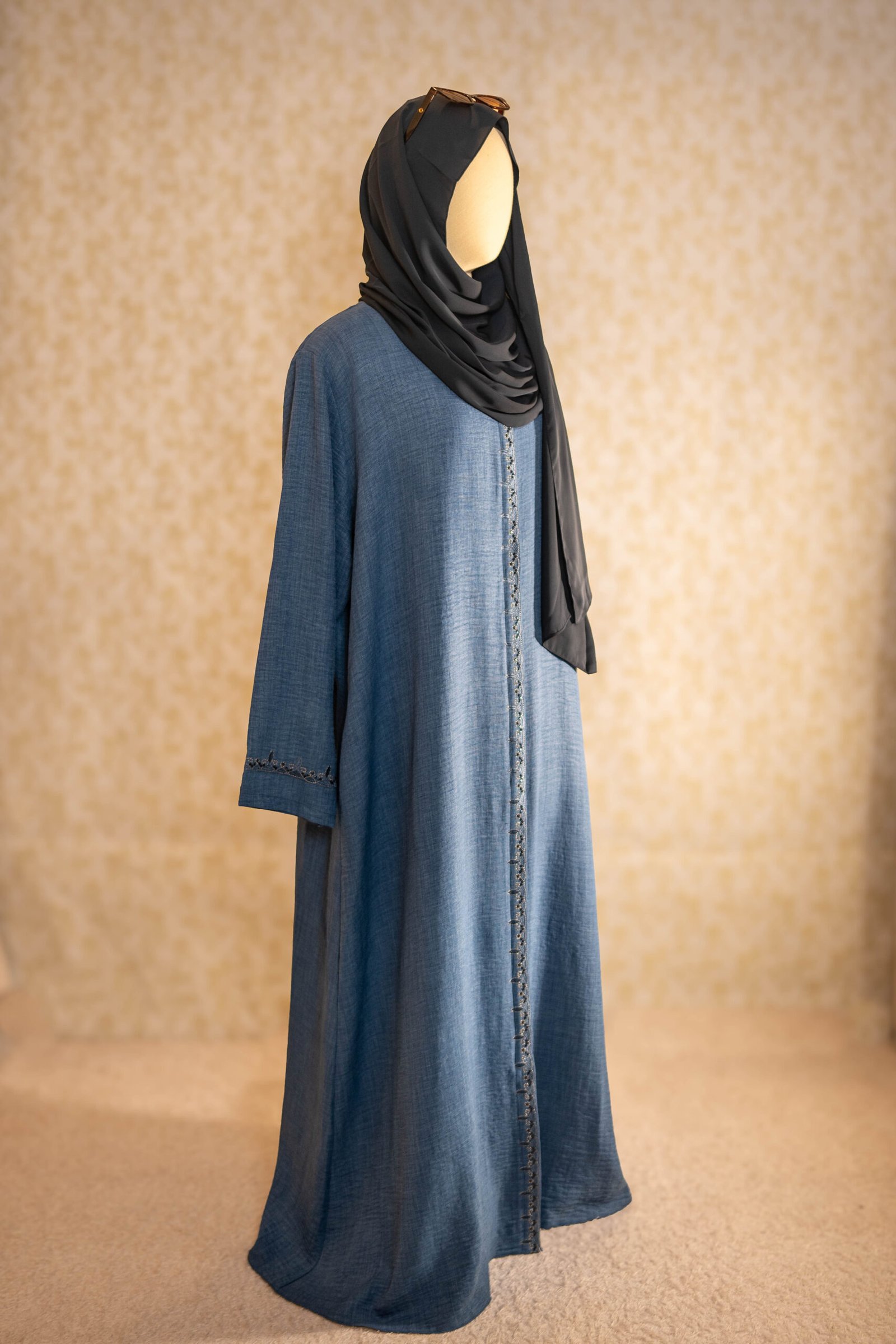Blue İNCİ embroidered Turkish abaya, full-length front view with a black hijab