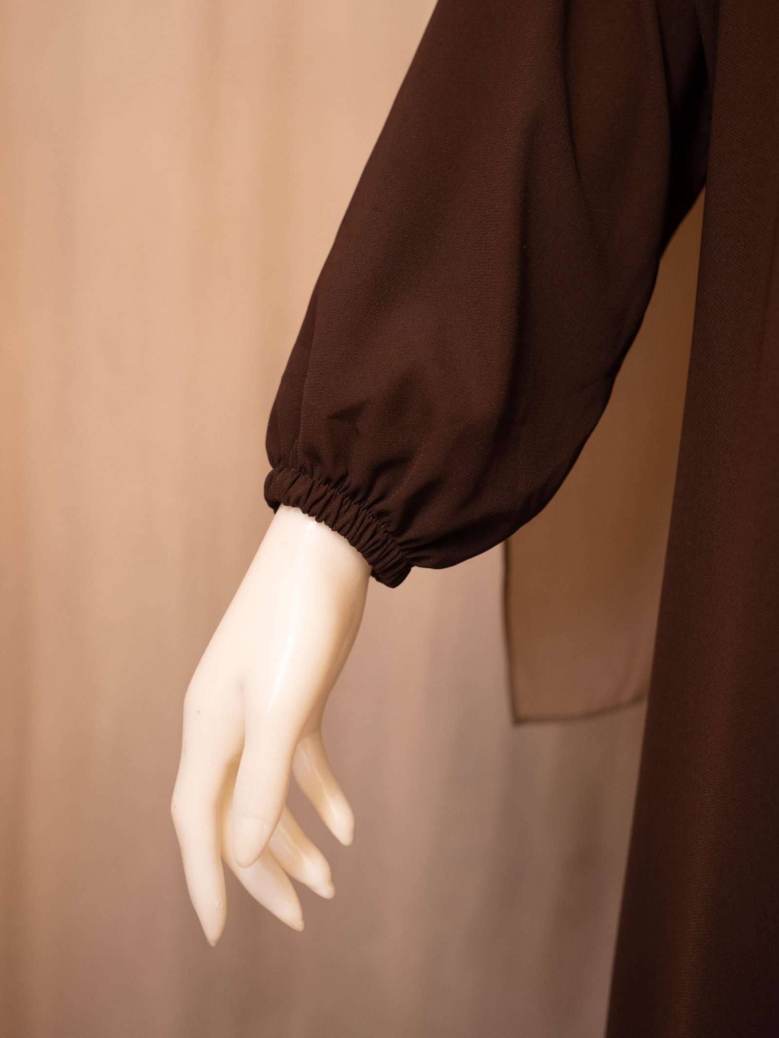 Brown Selma everyday Turkish abaya in matte nida, elastic sleeve cuff close-up