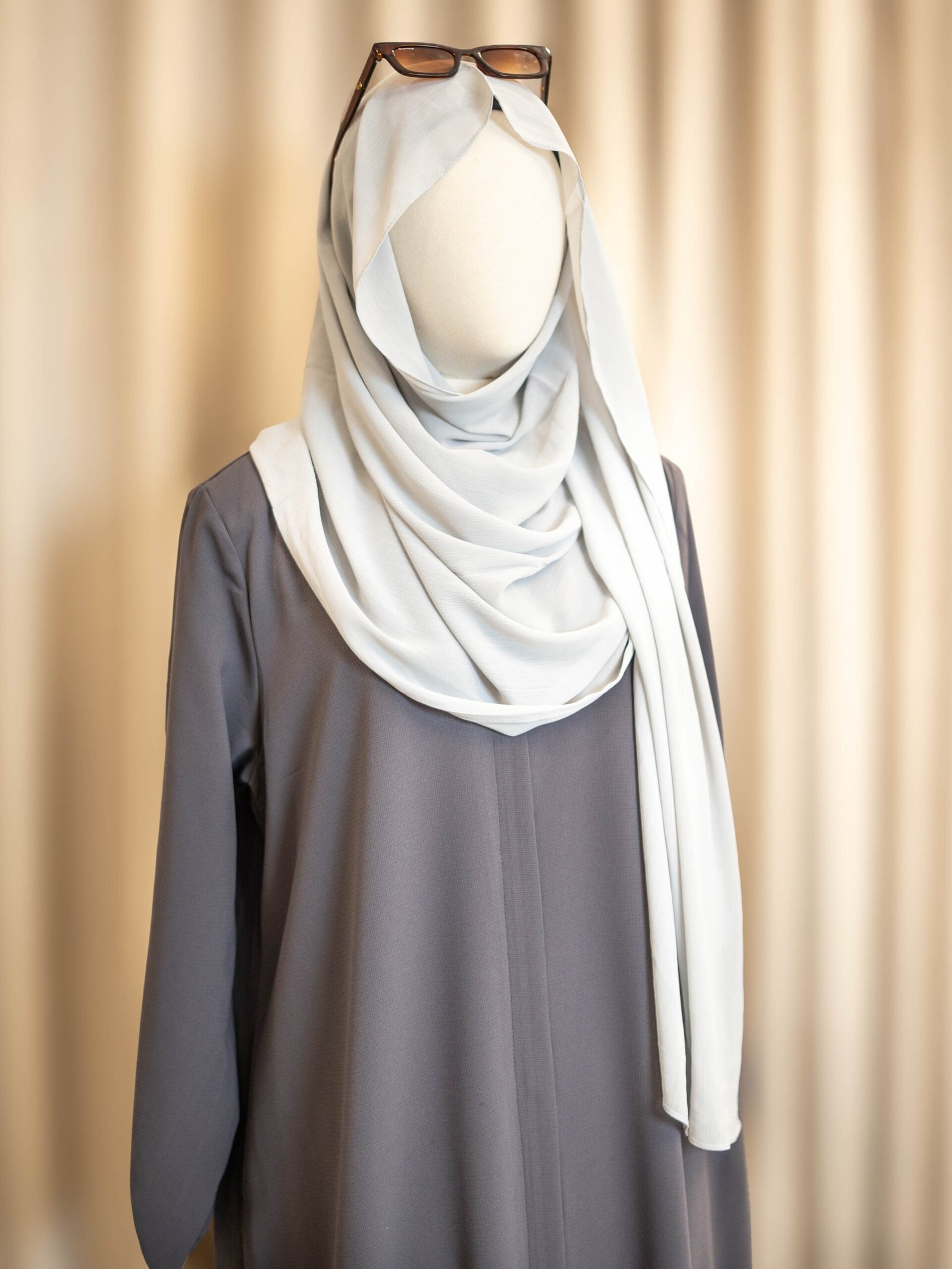 Grey Selma Winter Turkish abaya in waffle-weave cotton, full-length front view with a pale blue hijab